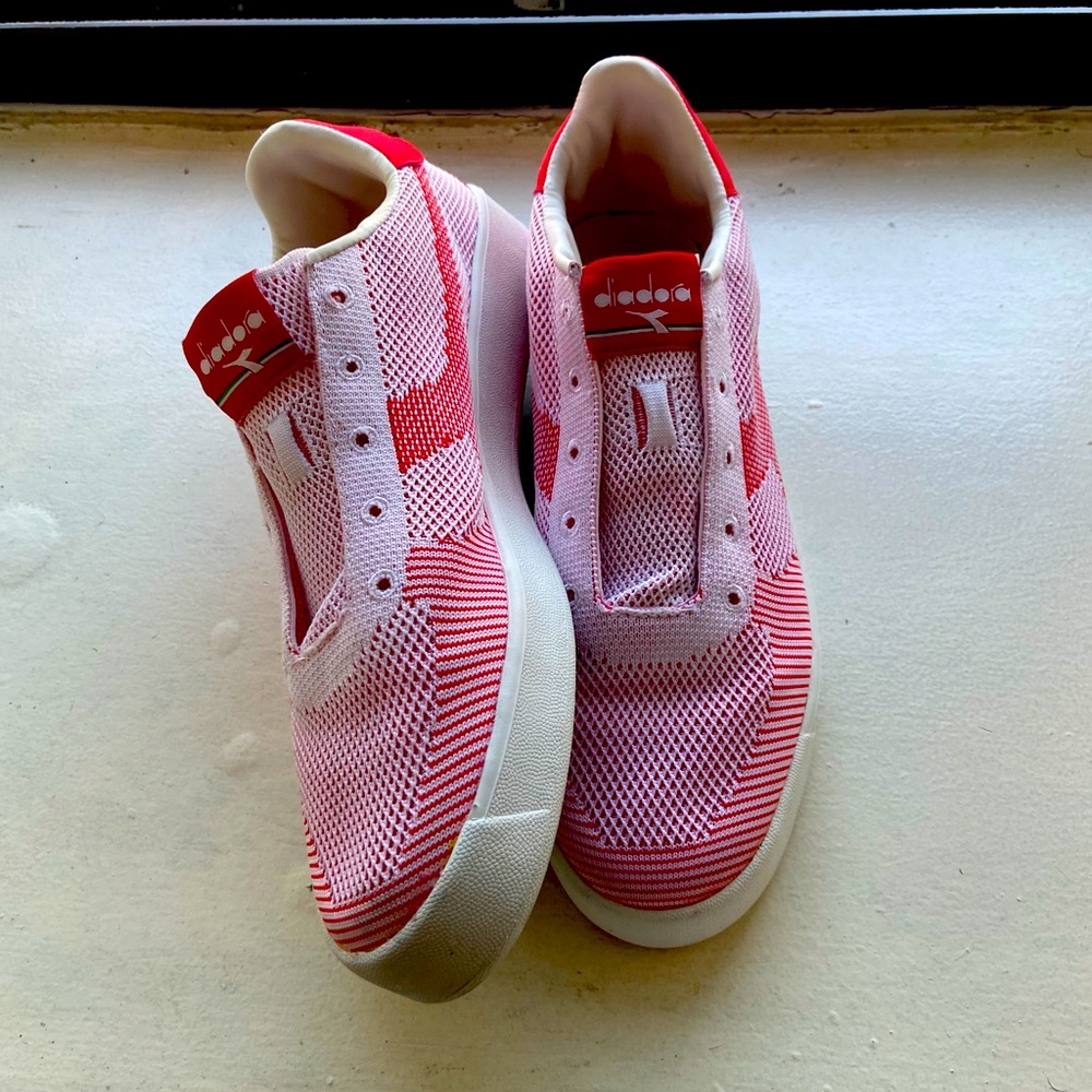 White and Red Diadora sneakers.